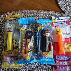 Pez dispenser lot of 4, crystal Sponge Bob,  Pokémon, Harry Potter, Etc.
